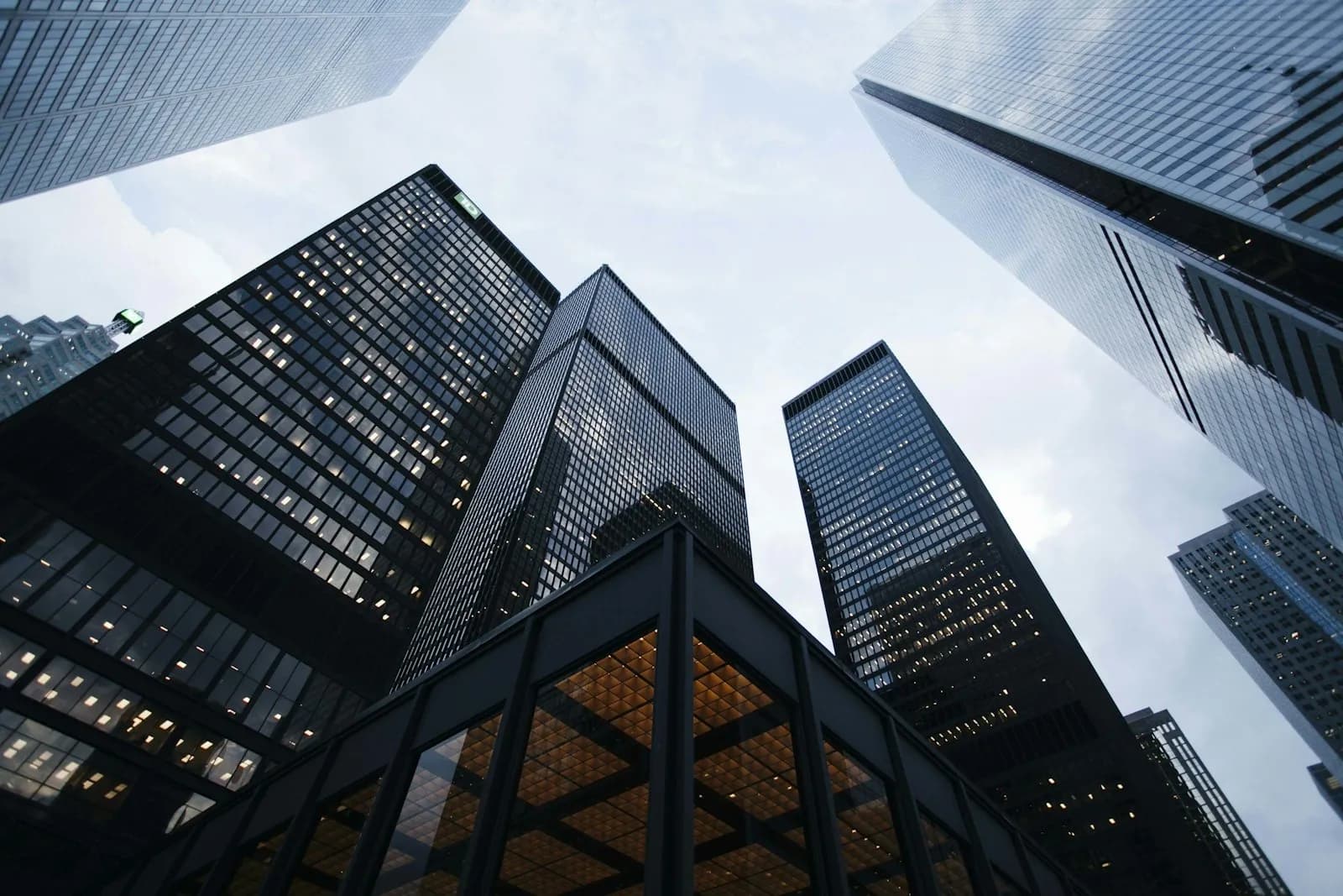 Upward view of glass financial-district towers