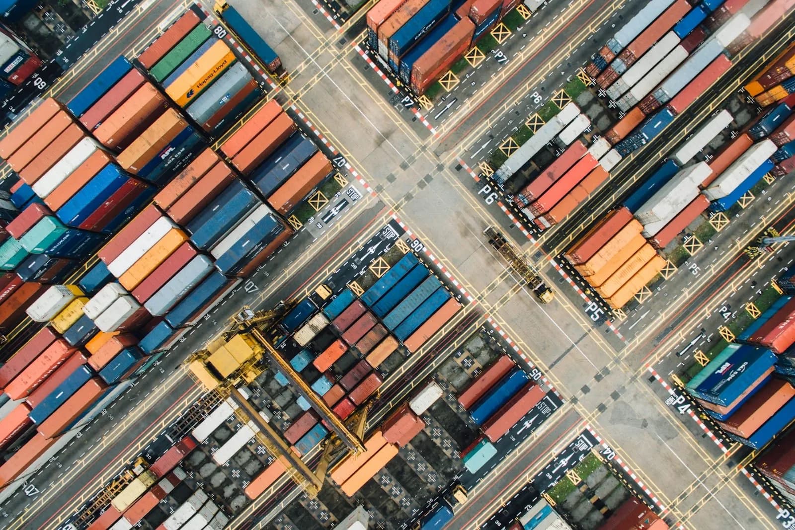 Overhead view of a container terminal with stacked freight